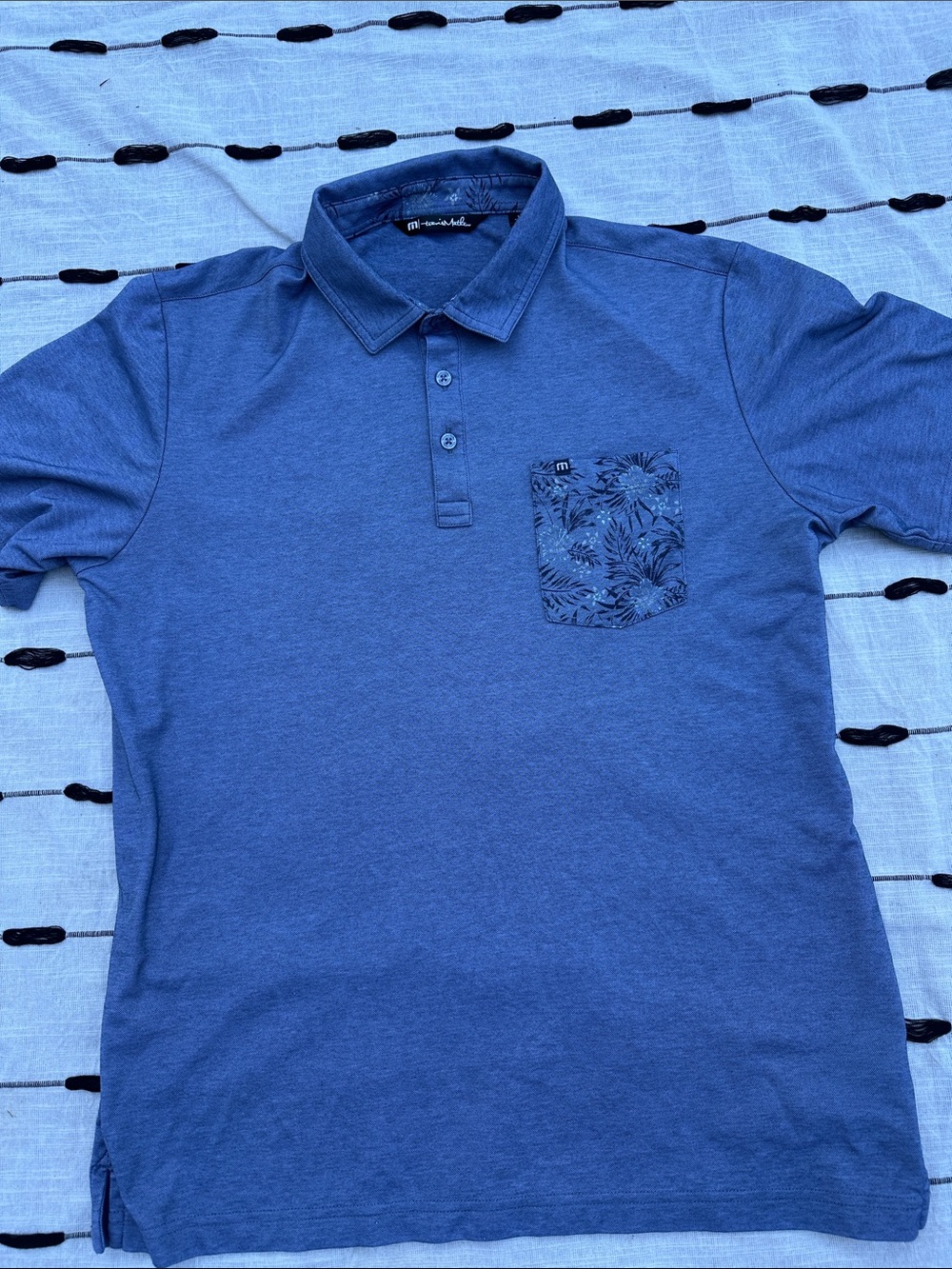 Travis Mathew Blue Polo with Patterned Chest Pocket size large